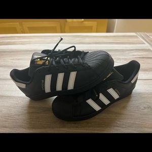 Black Adidas for kid size 8